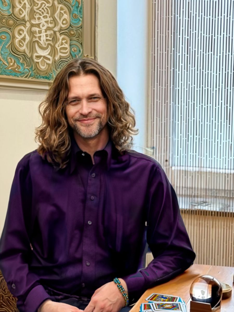 Zorian, tarot and numerology reader, photographed in his consulting room.